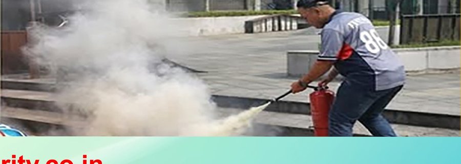 Fire safety drill — trainee tackling smoke and flame
